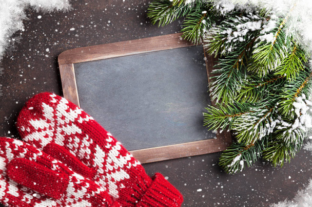 Christmas fir tree, mittens and chalkboard - Fotoğraf, Görsel