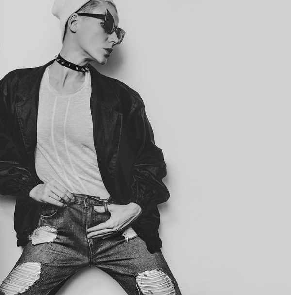 Black and white photo. Hipster Model Stylish Urban Swag. Autumn  - 写真・画像