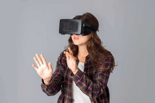 beauty woman testing virtual reality helmet - Фото, изображение