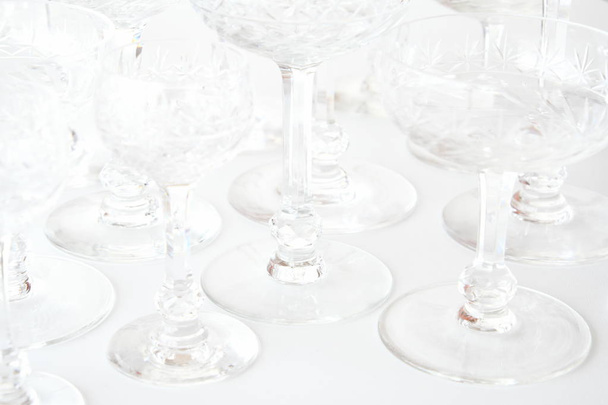 beautiful crystal glasses on white background - Foto, Imagen