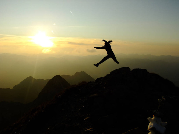 Woman Jumper on Mountains - Fotó, kép