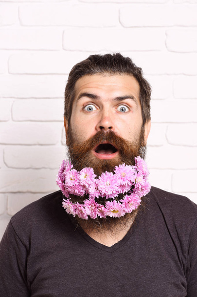 hipster with flowers in beard - Fotografie, Obrázek