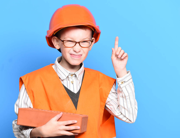 young cute builder boy - Фото, изображение