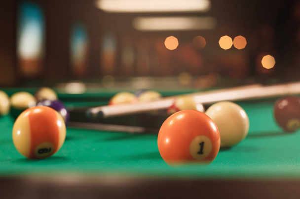 billiard balls and cues on pool table - Photo, Image