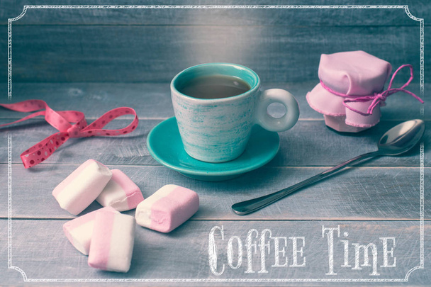 Coffee time. Cup of coffee, a jar of jam and marshmallows - Фото, зображення