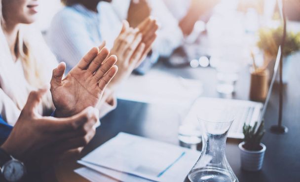 Close up view of business seminar listeners clapping hands. Professional education, work meeting, presentation or coaching concept.Horizontal,blurred background. - Photo, Image