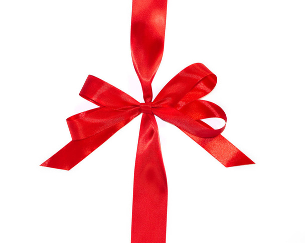 Red vertical gift ribbons and luxurious bow - Foto, afbeelding