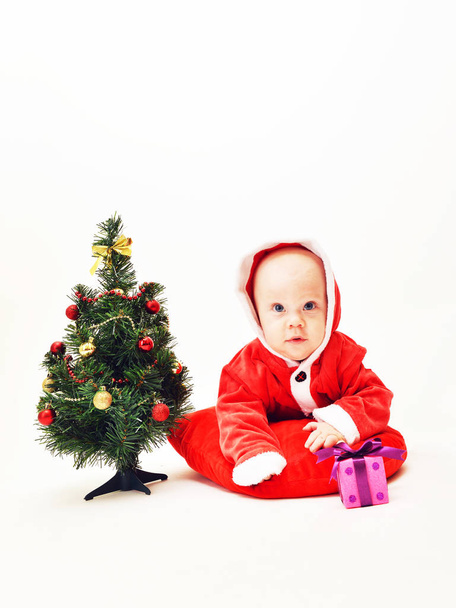  bébé dans les vêtements du Père Noël
 - Photo, image