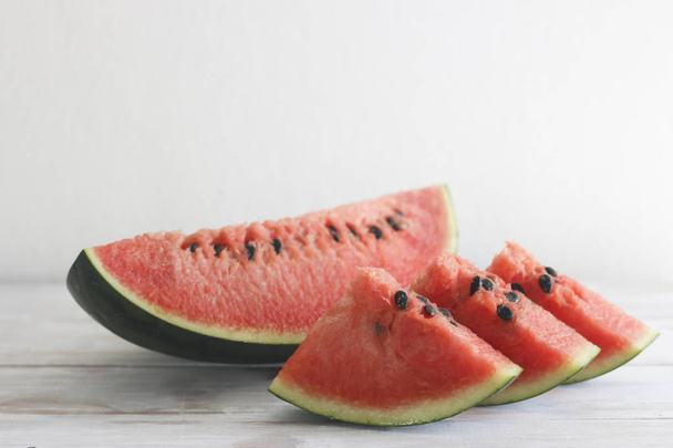 Stock Photo Fresh sliced watermelon wooden background - Fotografie, Obrázek