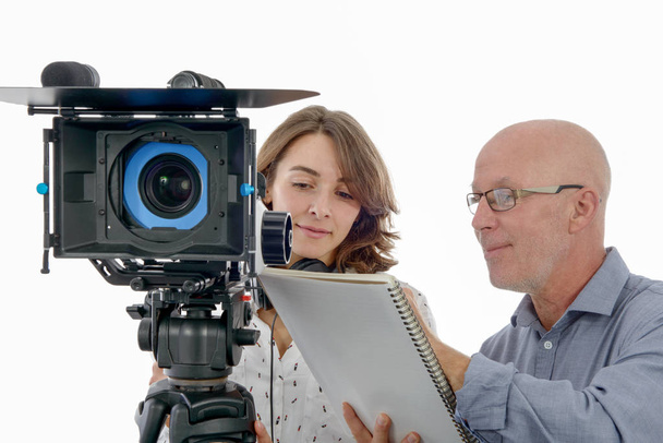 young woman cameraman and the mature man - Photo, Image