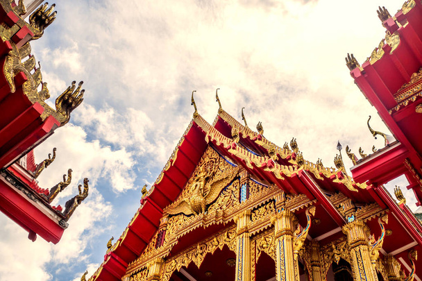 Thailand temple on a cloudy sky with the sun. - Photo, Image