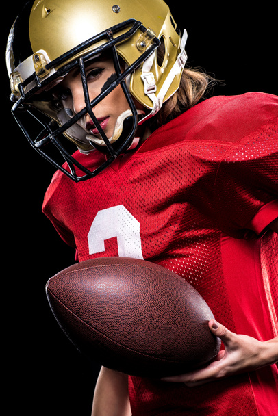 Female american football player in sportswear - Foto, Imagem