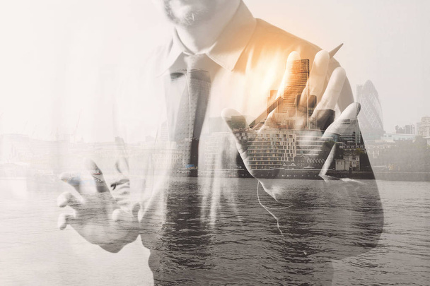 Double exposure of success businessman open his hand with London - Photo, Image