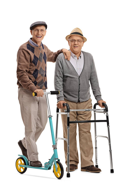 Senior with a scooter and a senior with a walker - Valokuva, kuva