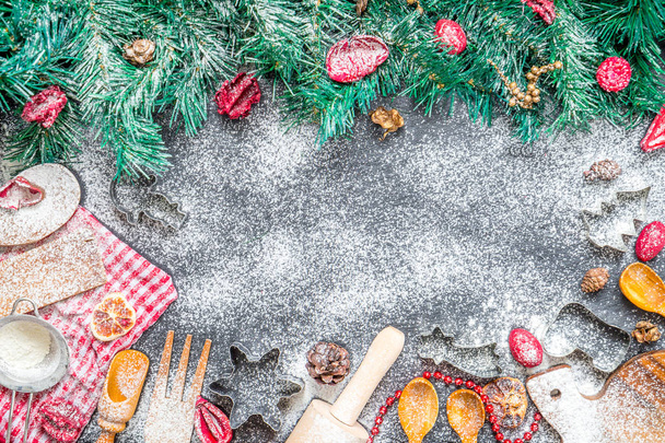 Amazing Christmas Background with Christmas Tree and Utensils for Christmas Cooking on Dark Stone Background, Top View Copy Space for your Text - Foto, Bild