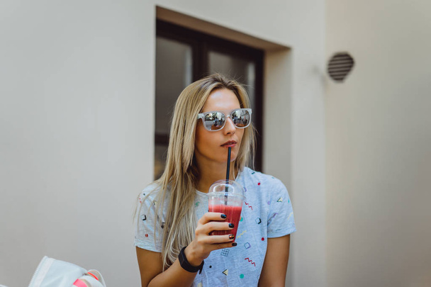 blonde woman with cocktail - Photo, image