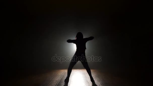 Dancer in studio with smooke on a dark background - Footage, Video