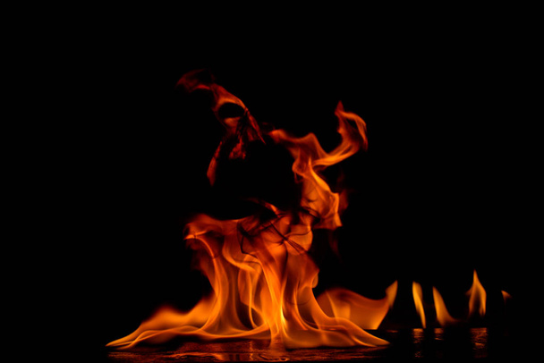 Beautiful fire flames on a black background. - Foto, Imagem