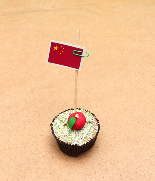 china flag on a apple cupcake,picture of a - Photo, Image