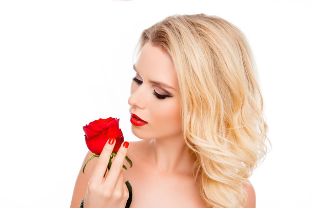 Young beautiful girl with perfect skin holding red rose - Photo, Image
