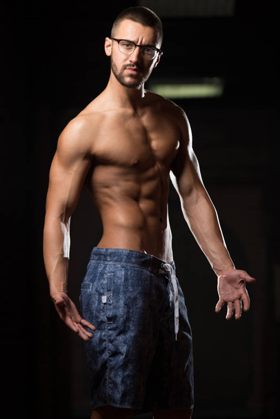 Portrait Of A Physically Fit Muscular Nerd Man - Fotografie, Obrázek