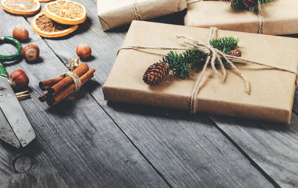 Christmas presents close up on a wooden table - Foto, imagen