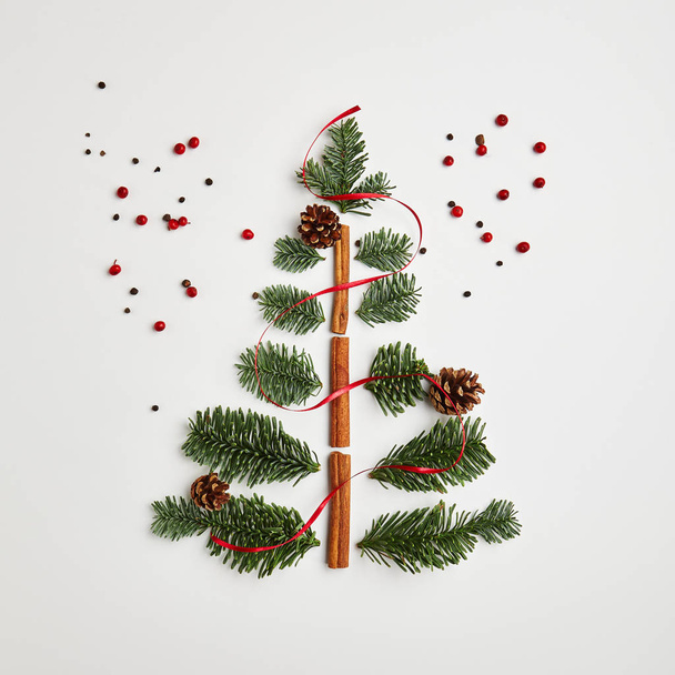 Christmas Tree made of Winter Foliage and Cinnamon Sticks - Photo, image