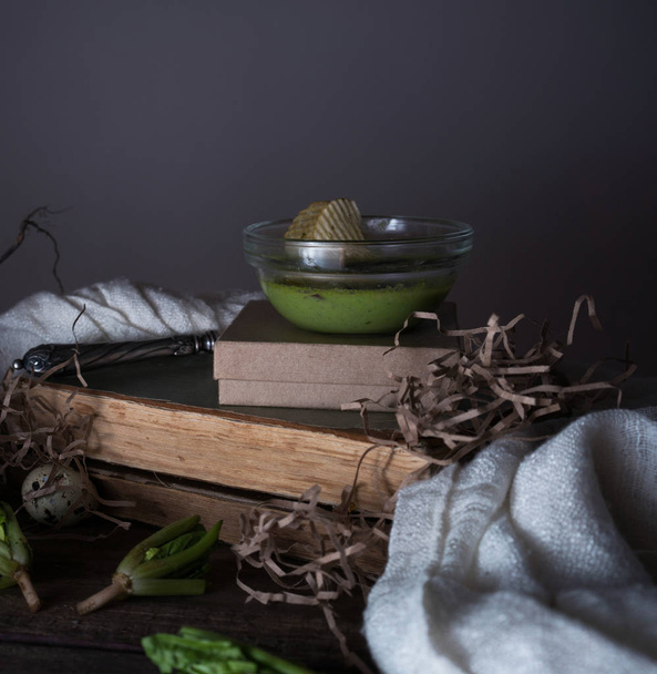 vintage, Provence. spinach soup in a glass bowl on rough rustic table. - 写真・画像
