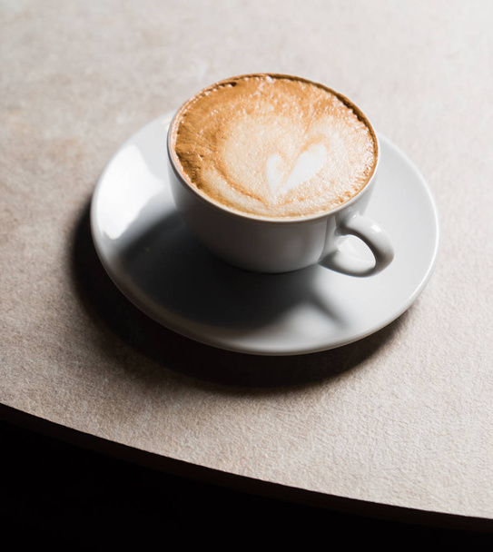 cup of cappuccino with foam  - Φωτογραφία, εικόνα