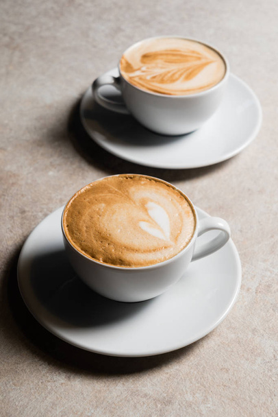 cups of cappuccino with foam  - Fotoğraf, Görsel