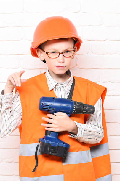 young cute builder boy - Foto, immagini