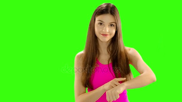 Chromakey footage Closeup portrait of young serious woman showing a time out , body language - Materiaali, video