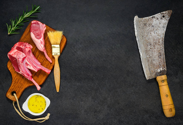 Raw Rib Chops with Meat Cleaver and Copy Space - Foto, Bild