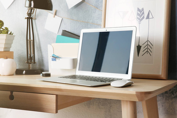 Comfortable workplace with laptop  - Фото, зображення