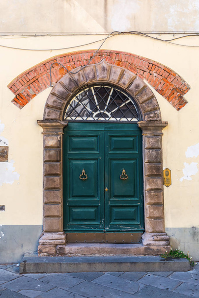 old door in Lucca, Italy - Photo, image