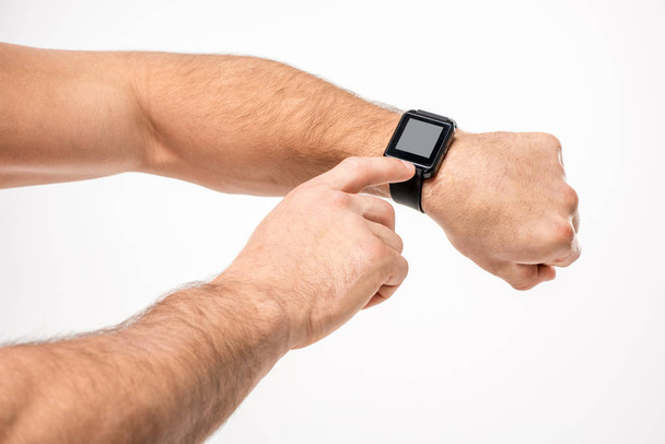 Man pointing on smartwatch - Photo, Image