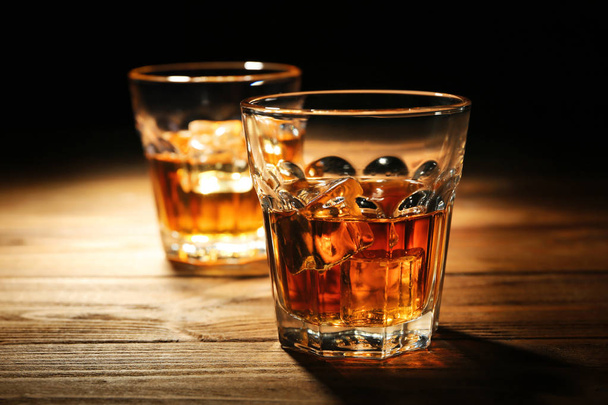 Glasses of whisky on table  - 写真・画像