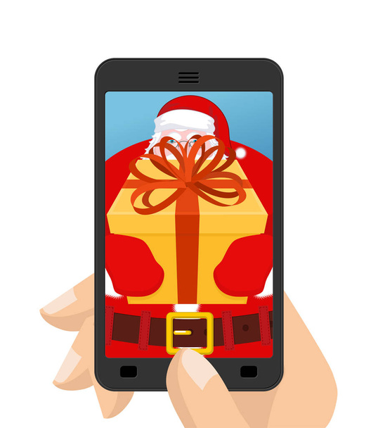 Christmas Photo Santa to give gift. Photographing your smartphon - Vector, Image