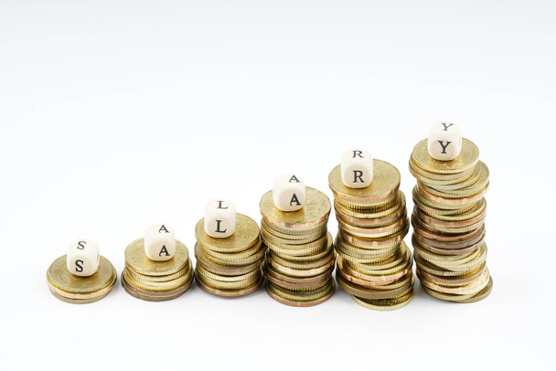 žluté mince stohování s financování podnikatelské koncepce. - Fotografie, Obrázek