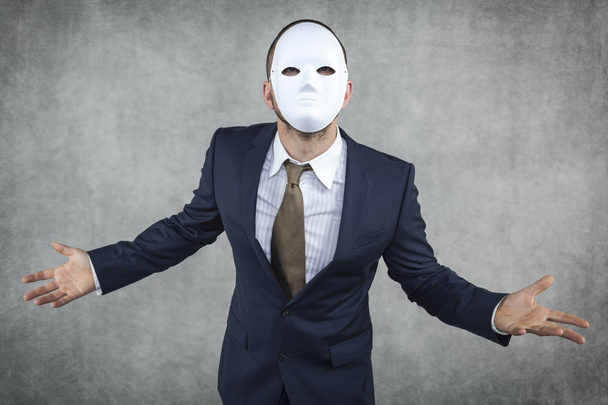 angry businessman wearing a mask - Фото, зображення