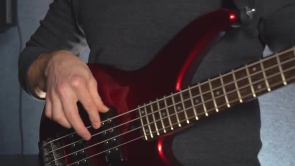 closeup guitarist in pop band - Materiał filmowy, wideo