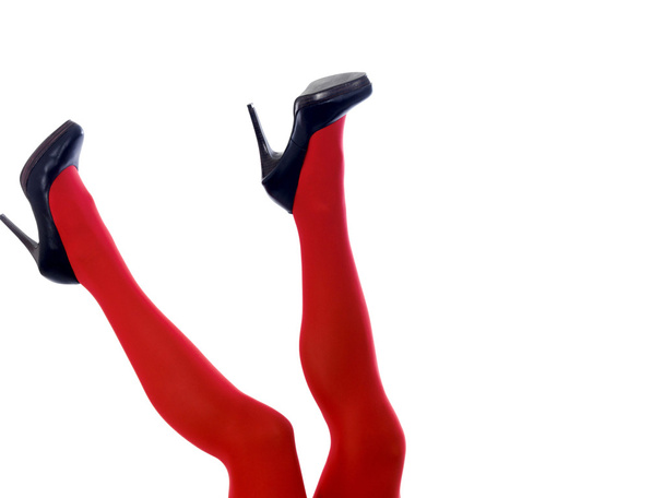 Frauenbeine in roten Strumpfhosen und High Heels - Foto, Bild