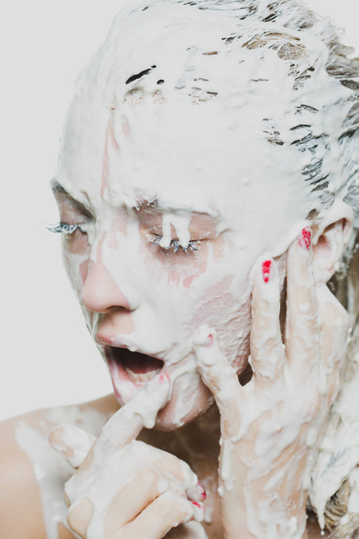 woman portrait with flowing white paint and face art - Foto, Bild