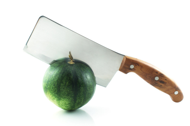 Green watermelon cuted by hatchet - Fotoğraf, Görsel