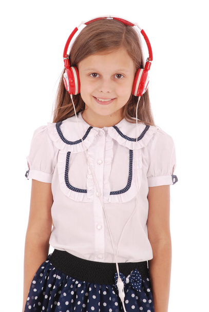 Happy young girl listening to music - Фото, зображення