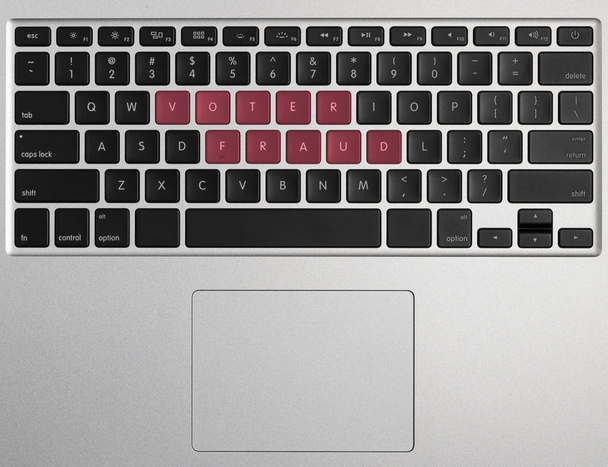 Laptop computer keyboard spelling Voter Fraud - Photo, Image