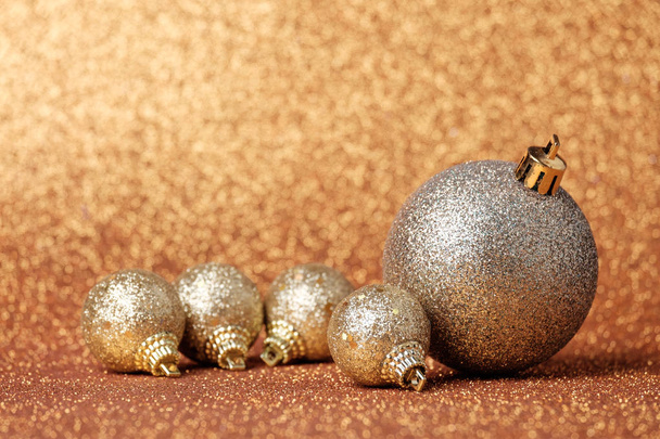 Christmas decorations on a glitter background - Fotoğraf, Görsel