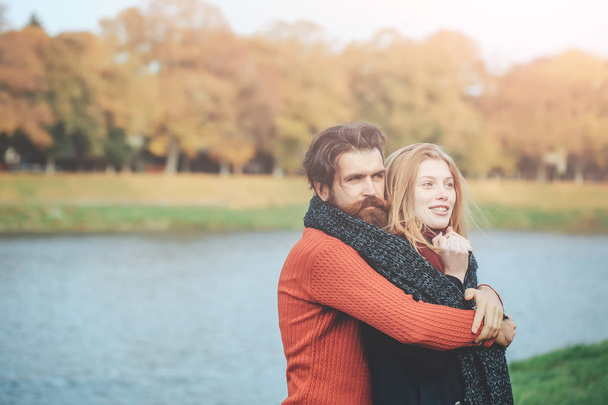 Young couple in autumn park - Fotó, kép