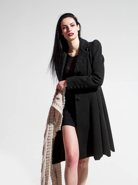 Pretty girl in black coat - Fotó, kép