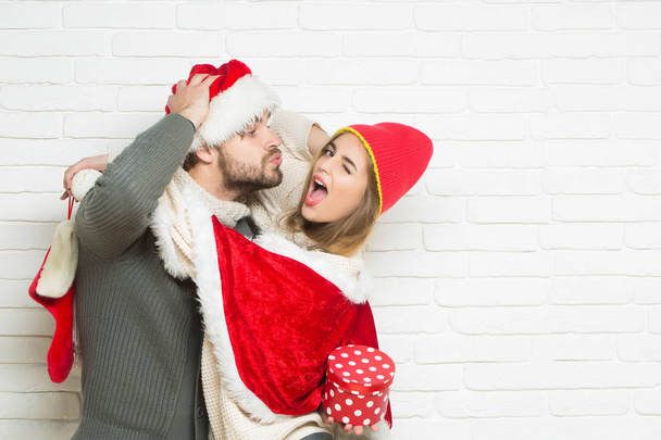 Young happy loving Christmas couple - Valokuva, kuva